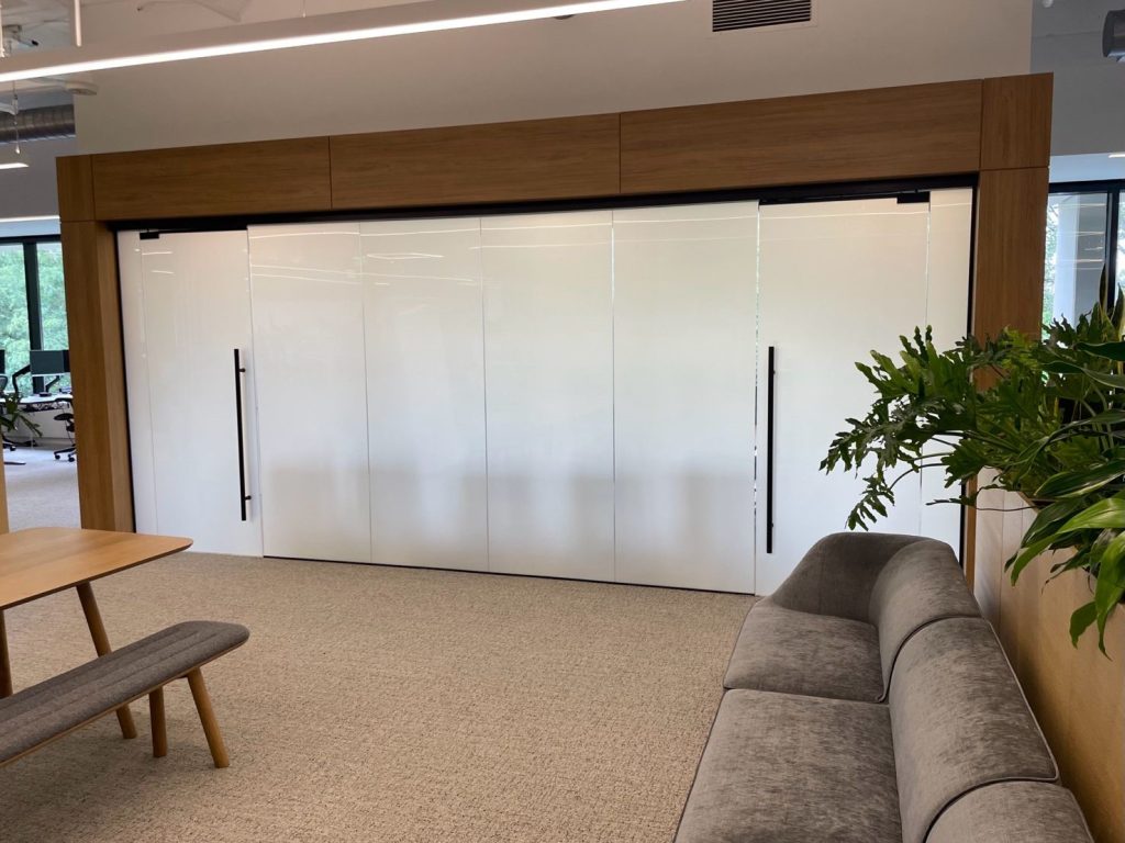 MetroWall’s LP Series with switchable glass turned on when visual privacy is needed.