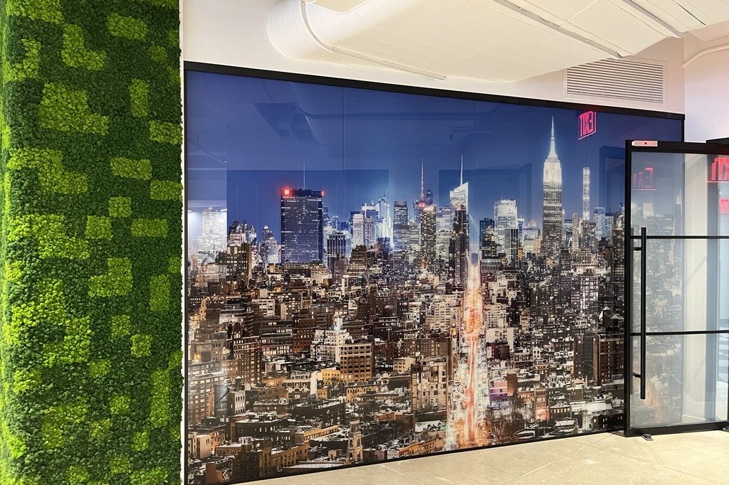 Custom glass wall in the entrance of MetroWall's showroom.