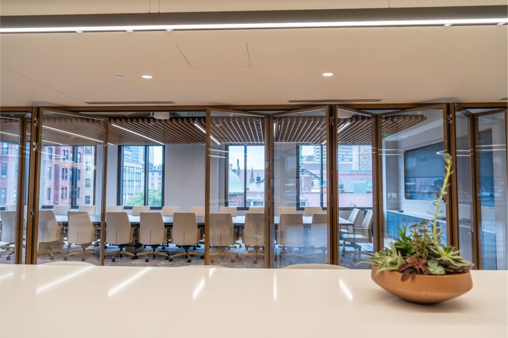 MetroWall's EXTEND Series with custom shadow gold powder-coated frame finishes. 